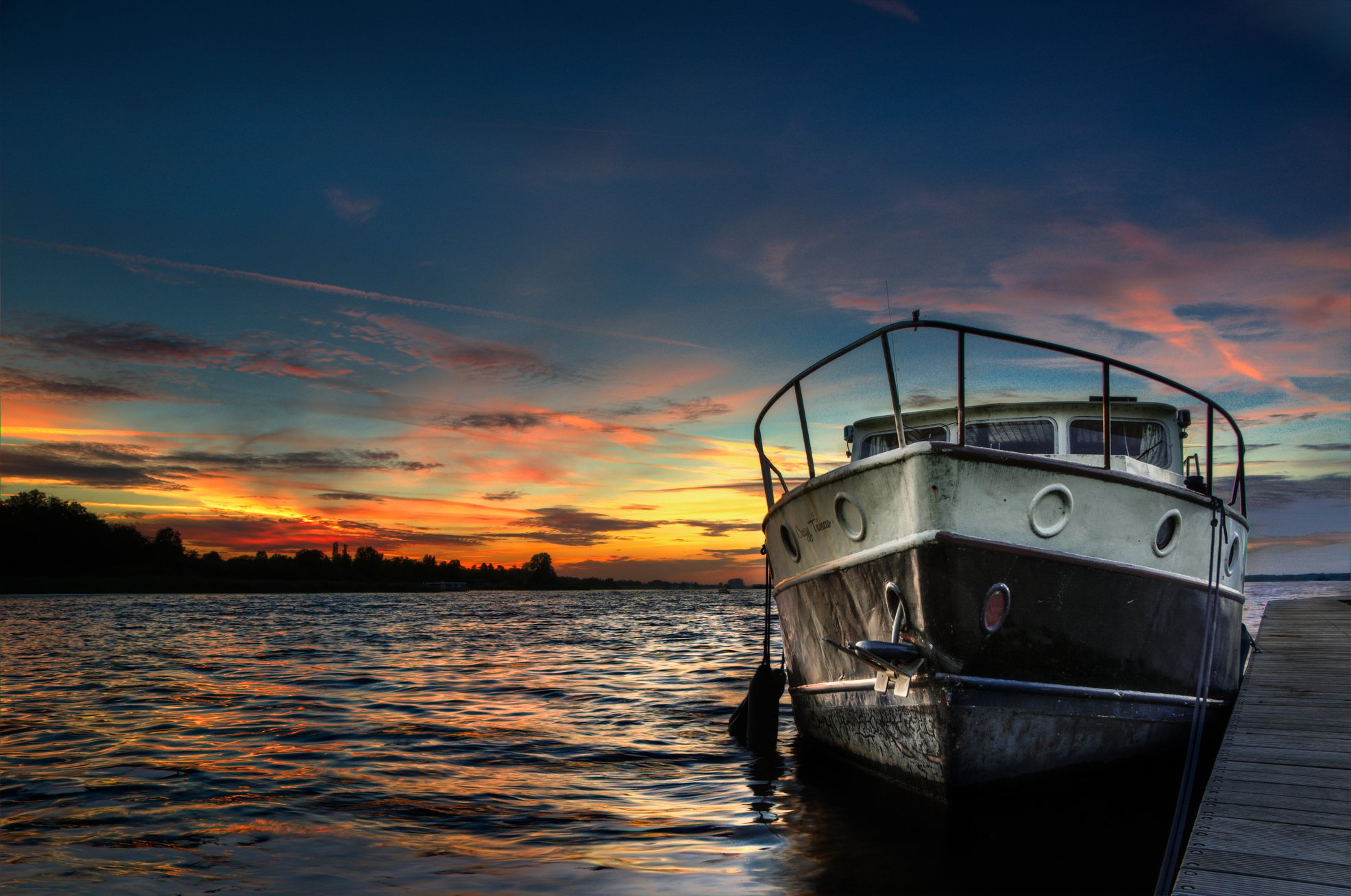 White Boat on Body of Water during Golden Hour