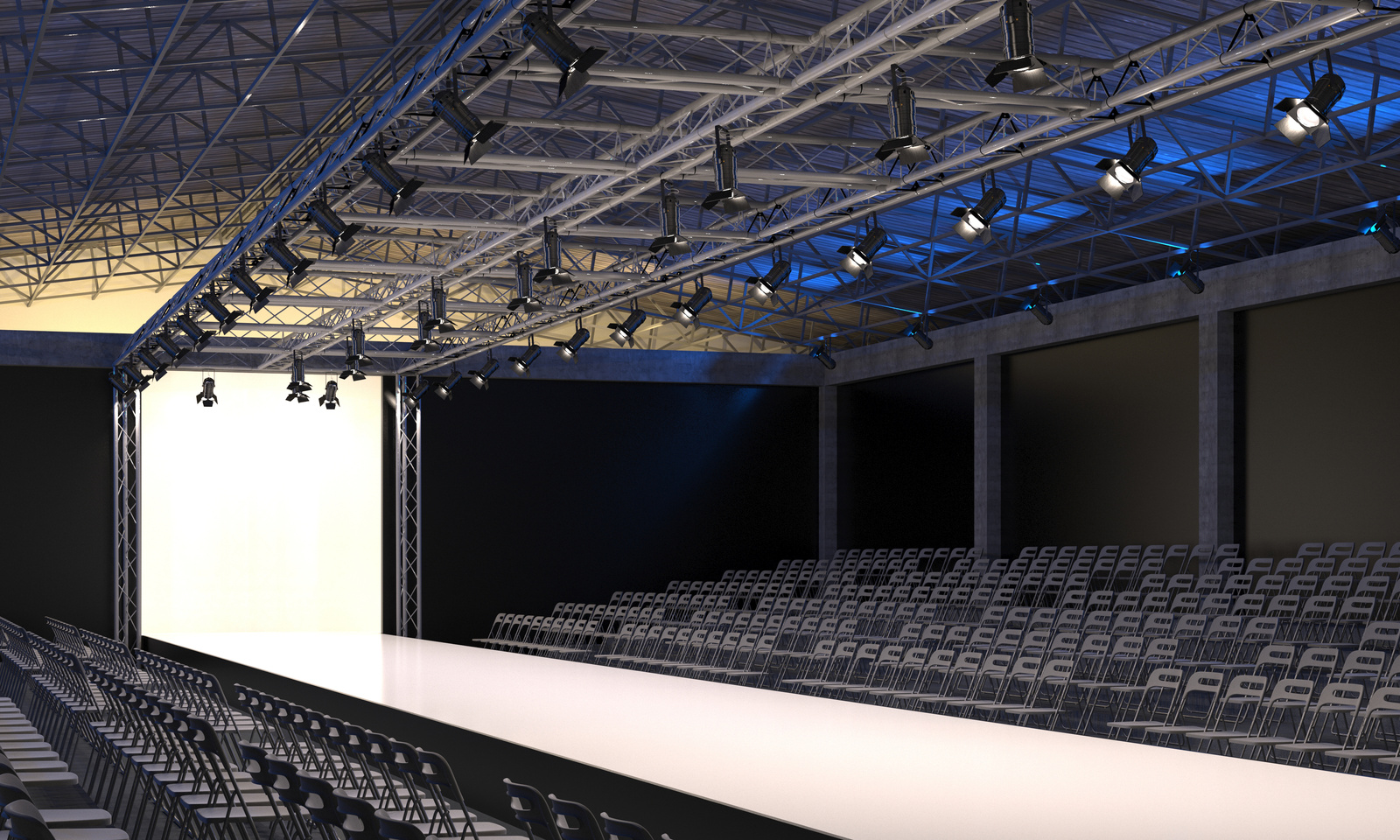 Interior of the auditorium with empty podium for fashion shows. Fashion runway before beginning of fashionable display.
